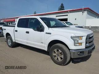 2015 Ford F-150 XLT with VIN 1FTEW1EP4FKE54734, listed as a IAAI auction lot 42137158 with 153,991 mi miles. Bid and sale history available at carsss.com. Image 1.