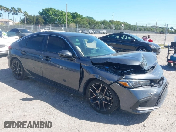 2023 Honda Civic Sport Touring z VIN 19XFL1H80PE017819, wystawiony jako IAAI lot #41833813 z przebiegiem 26 279 mil mil oraz . Historia ofert i sprzedaży dostępna na DreamBid. Obrazek 1.