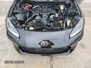2024 Toyota GR86 Premium with VIN JF1ZNBE14R8757705, listed as a Copart auction lot 88110395 with 15,128 mi miles and Salvage Title. Bid and sale history available at carsss.com. Image 12.