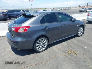 2010 Mitsubishi Lancer GTS z VIN JA32X8HW6AU005689, wystawiony jako IAAI lot #42467923 z przebiegiem 166 508 mil mil oraz . Historia ofert i sprzedaży dostępna na DreamBid. Obrazek 4.