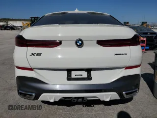 2020 BMW X6 xDrive40i z VIN 5UXCY6C00L9D45082, wystawiony jako Copart lot #52588665 z przebiegiem 40 810 mil mil oraz Szkoda całkowita • Salvage title. Historia ofert i sprzedaży dostępna na DreamBid. Obrazek 6.