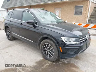 2021 Volkswagen Tiguan SE z VIN 3VV3B7AXXMM101773, wystawiony jako IAAI lot #42358588 z przebiegiem 105 629 mil mil oraz . Historia ofert i sprzedaży dostępna na DreamBid. Obrazek 1.