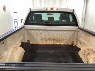 2013 Ford F-150 XL with VIN 1FTMF1CM3DKD43237, listed as a IAAI auction lot 42636389 with 164,975 mi miles and . Bid and sale history available at DreamBid. Image 2.