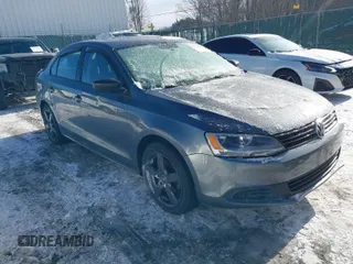 2014 Volkswagen Jetta Sedan S with VIN 3VW2K7AJ6EM354822, listed as a IAAI auction lot 41385188 with 176,138 mi miles. Bid and sale history available at carsss.com. Image 1.