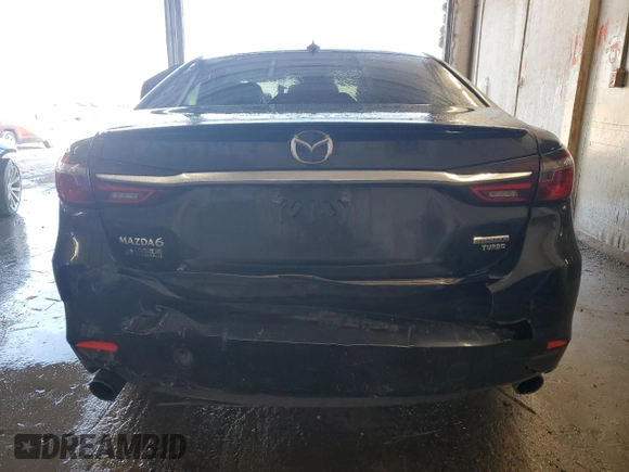 2021 Mazda 6 Carbon Edition with VIN JM1GL1WY9M1605756, listed as a Copart auction lot 46778355 with 60,063 mi miles and Salvage Title. Bid and sale history available at DreamBid. Image 6.