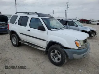 2001 Nissan Xterra XE with VIN 5N1ED28T71C595011, listed as a Copart auction lot 83204354 with Not Provided miles and Salvage Title. Bid and sale history available at DreamBid. Image 4.