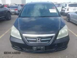 2007 Honda Odyssey EX-L with VIN 5FNRL38627B041332, listed as a IAAI auction lot 41934767 with 234,332 mi miles and . Bid and sale history available at carsss.com. Image 12.