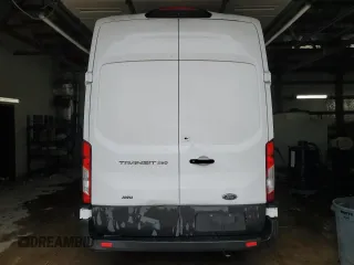 2023 Ford Transit Cargo with VIN 1FTBR3U89PKA70899, listed as a Copart auction lot 77940504 with 62,196 mi miles and Clean Title. Bid and sale history available at DreamBid. Image 6.