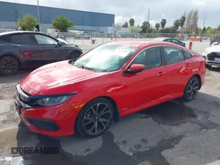 2019 Honda Civic Sport with VIN 2HGFC2F8XKH518773, listed as a IAAI auction lot 41934846 with 140,684 mi miles and . Bid and sale history available at DreamBid. Image 2.