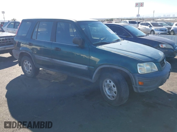 1999 Honda CR-V LX with VIN JHLRD1847XC031475, listed as a IAAI auction lot 41606369 with 254,445 mi miles. Bid and sale history available at carsss.com. Image 1.