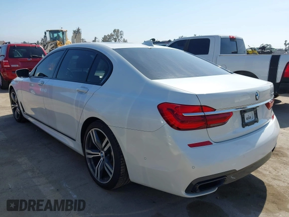 2019 BMW 7 Series 750i with VIN WBA7F0C5XKGM25771, listed as a IAAI auction lot 42167614 with 73,692 mi miles. Bid and sale history available at carsss.com. Image 3.