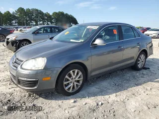 2010 Volkswagen Jetta Limited Edition z VIN 3VWRZ7AJ2AM071256, wystawiony jako Copart lot #63097445 z przebiegiem 132 690 mil mil oraz Szkoda całkowita • Salvage title. Historia ofert i sprzedaży dostępna na DreamBid. Obrazek 1.