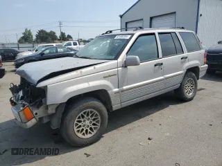 1995 Jeep Grand Cherokee Limited with VIN 1J4GZ78S3SC517243, listed as a Copart auction lot 65490284 with 257,286 mi miles and Salvage Title. Bid and sale history available at carsss.com. Image 1.