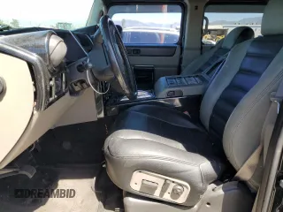 2003 Hummer H2 with VIN 5GRGN23U73H122529, listed as a Copart auction lot 50157934 with 0 mi miles and Salvage Title. Bid and sale history available at carsss.com. Image 7.