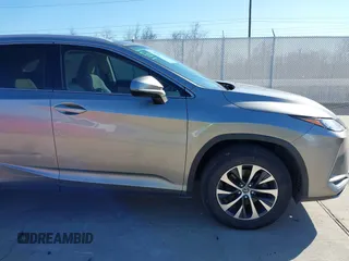 2020 Lexus RX with VIN 2T2AZMAA7LC173478, listed as a IAAI auction lot 41671494 with 91,777 mi miles. Bid and sale history available at carsss.com. Image 13.
