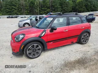 2015 MINI Countryman S with VIN WMWZC5C51FWP44342, listed as a Copart auction lot 61722955 with 115,889 mi miles and Salvage title. Bid and sale history available at DreamBid. Image 1.