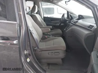 2016 Honda Odyssey SE with VIN 5FNRL5H32GB155946, listed as a IAAI auction lot 41590237 with 140,167 mi miles. Bid and sale history available at carsss.com. Image 5.