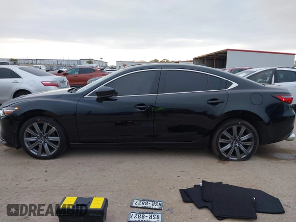 2020 Mazda 6 Grand Touring with VIN JM1GL1TY5L1513949, listed as a IAAI auction lot 40953540 with 55,616 mi miles and . Bid and sale history available at DreamBid. Image 14.