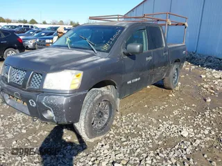 2005 Nissan Titan SE with VIN 1N6AA07BX5N502188, listed as a IAAI auction lot 41458002 with 207,154 mi miles. Bid and sale history available at carsss.com. Image 2.