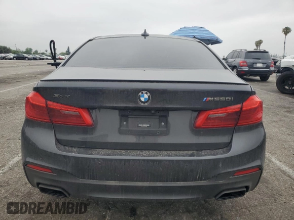 2019 BMW 5 Series M550i xDrive with VIN WBAJB9C59KB287501, listed as a Copart auction lot 59732425 with 74,345 mi miles and Salvage title. Bid and sale history available at DreamBid. Image 6.