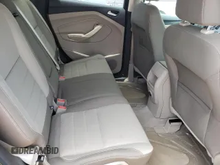 2014 Ford Escape SE z VIN 1FMCU0GX6EUA02674, wystawiony jako Copart lot #57833695 z przebiegiem 61 872 mil mil oraz Szkoda całkowita • Salvage title. Historia ofert i sprzedaży dostępna na DreamBid. Obrazek 11.