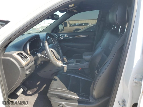 2017 Jeep Grand Cherokee Overland with VIN 1C4RJECGXHC868236, listed as a Copart auction lot 72374654 with 99,528 mi miles and Salvage Title. Bid and sale history available at carsss.com. Image 7.