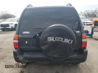 2003 Suzuki Grand Vitara z VIN JS3TE62V834101506, wystawiony jako Copart lot #47094765 z przebiegiem 240 778 mil mil oraz Szkoda całkowita • Salvage title. Historia ofert i sprzedaży dostępna na DreamBid. Obrazek 6.