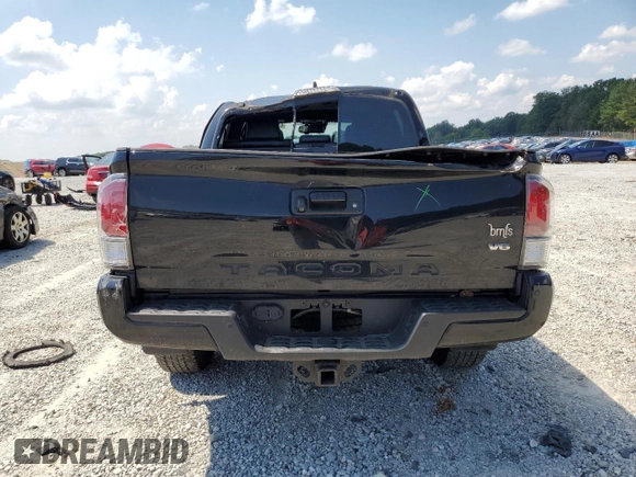 2023 Toyota Tacoma SR with VIN 3TMCZ5AN3PM571922, listed as a Copart auction lot 61872775 with 34,501 mi miles and Salvage title. Bid and sale history available at DreamBid. Image 6.