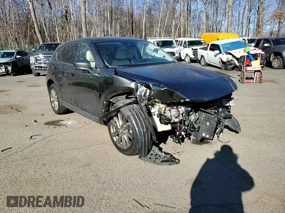 2021 Mazda CX-5 Grand Touring with VIN JM3KFBDM1M0489859, listed as a Copart auction lot 48688905 with 36,882 mi miles and Salvage Title. Bid and sale history available at DreamBid. Image 12.