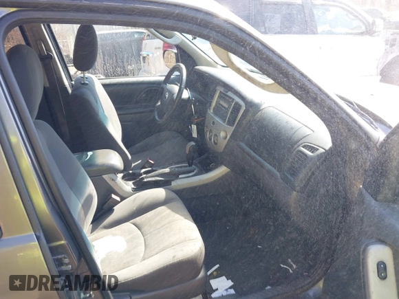 2006 Mazda Tribute i with VIN 4F2YZ92Z16KM25216, listed as a IAAI auction lot 41664006 with 228,222 mi miles and . Bid and sale history available at carsss.com. Image 5.