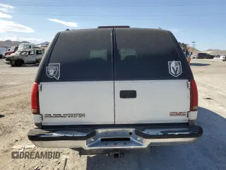 1998 GMC Suburban z VIN 1GKEC16R0WJ712847, wystawiony jako Copart lot #68557804 z przebiegiem 262 538 mil mil oraz Szkoda całkowita • Salvage title. Historia ofert i sprzedaży dostępna na DreamBid. Obrazek 6.