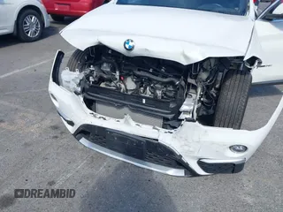 2018 BMW X1 xDrive28i with VIN WBXHT3C37J5K28375, listed as a IAAI auction lot 42039336 with 28,664 mi miles. Bid and sale history available at carsss.com. Image 6.