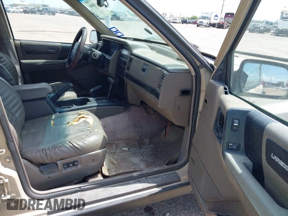 1995 Jeep Grand Cherokee Laredo with VIN 1J4GZ58Y5SC541987, listed as a IAAI auction lot 42430890 with 246,824 mi miles and . Bid and sale history available at DreamBid. Image 5.