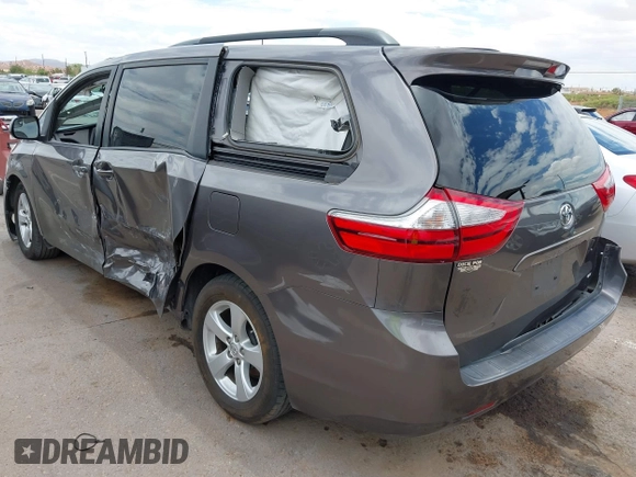 2015 Toyota Sienna LE AAS with VIN 5TDKK3DC8FS531431, listed as a IAAI auction lot 42372601 with 63,633 mi miles and . Bid and sale history available at DreamBid. Image 3.
