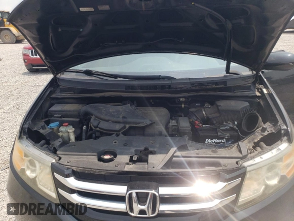 2014 Honda Odyssey EX-L with VIN 5FNRL5H6XEB072305, listed as a Copart auction lot 58487545 with 152,933 mi miles and Salvage title. Bid and sale history available at DreamBid. Image 12.