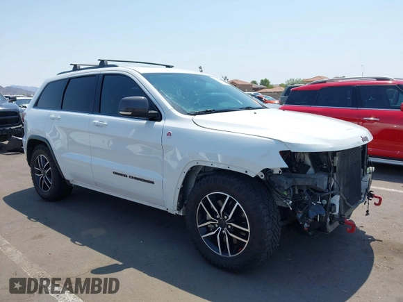2019 Jeep Grand Cherokee Trailhawk with VIN 1C4RJFLT7KC751143, listed as a IAAI auction lot 42749406 with 54,024 mi miles and . Bid and sale history available at DreamBid. Image 1.