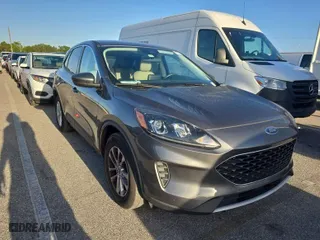 2021 Ford Escape SE with VIN 1FMCU9G69MUA42712, listed as a IAAI auction lot 42036251 with 26,476 mi miles. Bid and sale history available at carsss.com. Image 1.