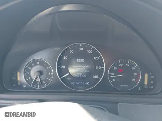 2005 Mercedes-Benz CLK-Class 5.0L with VIN WDBTK75J85F126398, listed as a IAAI auction lot 41890954 with 124,554 mi miles. Bid and sale history available at carsss.com. Image 7.