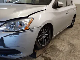 2014 Nissan Sentra S with VIN 3N1AB7AP6EY299710, listed as a IAAI auction lot 41505297 with 124,994 mi miles and . Bid and sale history available at DreamBid. Image 6.