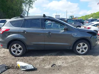 2016 Ford Escape SE с VIN 1FMCU9GX6GUB27794, выставлен на аукционе IAAI как лот 42292204 с пробегом 186 434 миль миль и . История ставок и продаж доступна на DreamBid. Изображение 14.