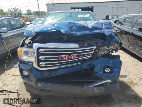 2020 GMC Canyon 4WD SLE with VIN 1GTG6CEN6L1154424, listed as a Copart auction lot 62439064 with 86,739 mi miles and Salvage Title. Bid and sale history available at carsss.com. Image 5.