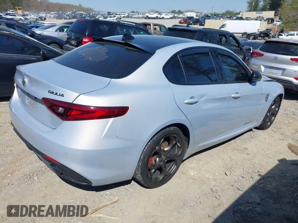 2021 Alfa Romeo Giulia Ti Sport with VIN ZARFAMBN1M7641345, listed as a IAAI auction lot 41856804 with 55,138 mi miles and . Bid and sale history available at DreamBid. Image 4.