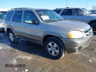 2002 Mazda Tribute LX with VIN 4F2YU08122KM34058, listed as a IAAI auction lot 41439941 with 138,725 mi miles and . Bid and sale history available at carsss.com. Image 1.