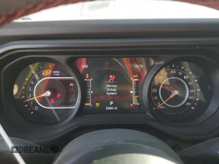 2024 Jeep Wrangler Rubicon with VIN 1C4PJXFG9RW346079, listed as a Copart auction lot 77006914 with 2,446 mi miles and Salvage Title. Bid and sale history available at DreamBid. Image 9.