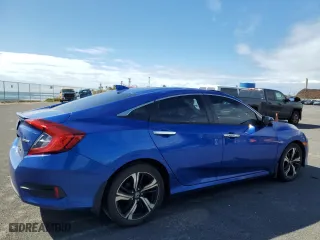 2017 Honda Civic Sedan Touring with VIN 19XFC1F97HE029141, listed as a Copart auction lot 44219085 with 101,799 mi miles and Salvage Title. Bid and sale history available at carsss.com. Image 3.