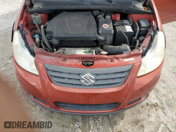 2013 Suzuki SX4 with VIN JS2YB5A42D6100038, listed as a Copart auction lot 73148344 with 141,675 mi miles and Salvage Title. Bid and sale history available at DreamBid. Image 11.
