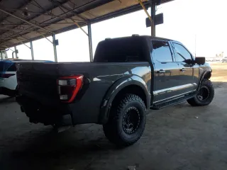 2021 Ford F-150 Raptor with VIN 1FTFW1RG2MFC58232, listed as a Copart auction lot 42979795 with 56,832 mi miles and Salvage Title. Bid and sale history available at carsss.com. Image 3.
