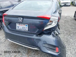 2020 Honda Civic LX z VIN 19XFC2F69LE203697, wystawiony jako IAAI lot #41608520 z przebiegiem 46 735 mil mil oraz . Historia ofert i sprzedaży dostępna na DreamBid. Obrazek 16.
