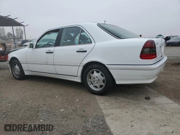 2000 Mercedes-Benz C 230 Kompressor with VIN WDBHA24G1YF946926, listed as a Copart auction lot 70884494 with 115,791 mi miles and Salvage Title. Bid and sale history available at carsss.com. Image 2.