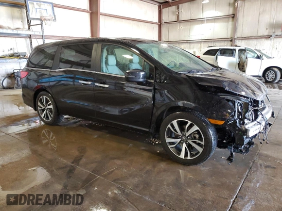 2021 Honda Odyssey Touring with VIN 5FNRL6H84MB009125, listed as a Copart auction lot 58248385 with 55,360 mi miles and Salvage title. Bid and sale history available at DreamBid. Image 4.